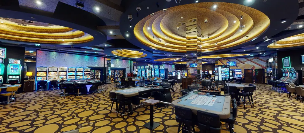 Casino Win Győr földi kaszinó Magyarországon, modern játékgépek, rulettasztalok és elegáns belső tér prémium szórakozási környezetben